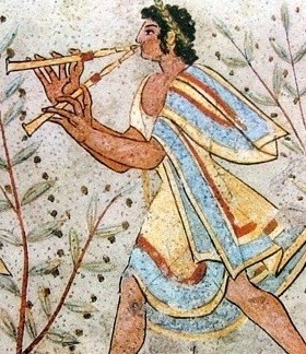 Un musico allieta il banchetto